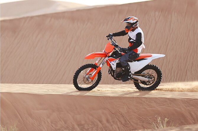 1-Hour KTM 450CC Dirt bike Desert Adventure Tours in Dubai - Riding across the sandy desert