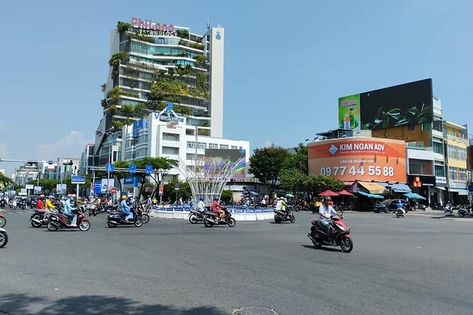Da Nang Food Tour Motorbike & Sightseeing By Ao Dai Lady Rider - Sun Wheel and the Da Nang night market