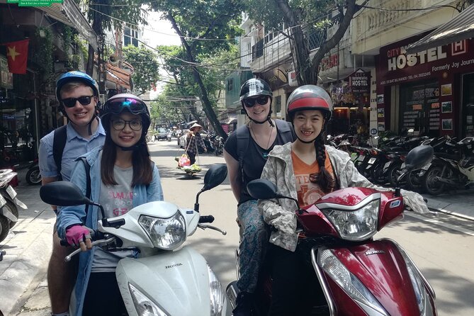 Half-Day Guided Hanoi Motorcycle Tour with Hotel Pickup - Long Bien Bridge and Ngoc Lam wet market