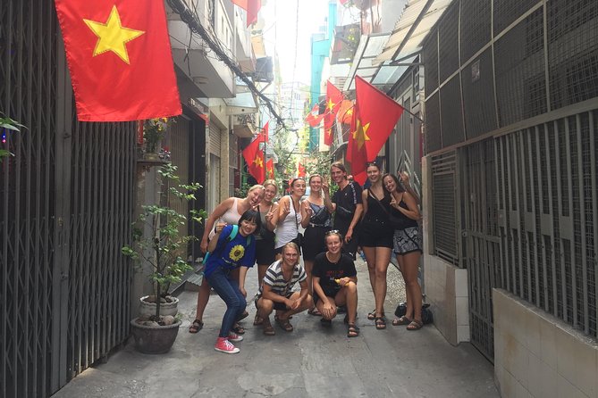 Ho Chi Minh City: Hidden Gems & Back Alleys by Motorbike with Local Students - Pickup areas, price, and cancellation