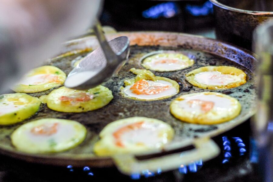 Ho Chi Minh City: Private Street Food Motorbike Tour - Flower market and the charcoal grill in a local market