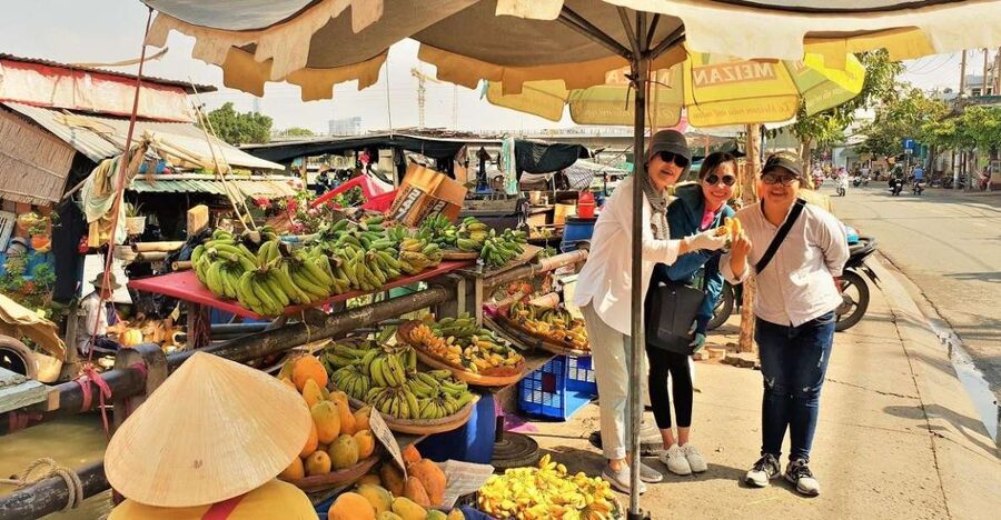 Ho Chi Minh City: Saigon Morning Markets Tour by Motorbike - Leaving District 1 by motorbike