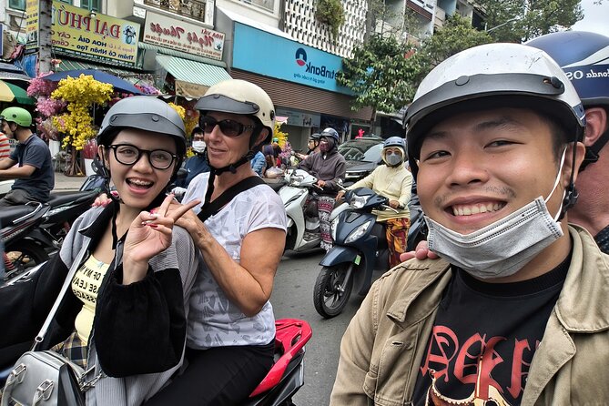 Ho Chi Minh City Sightseeing & Culture Tour By Scooters - Nguyen Hue Street and the city center