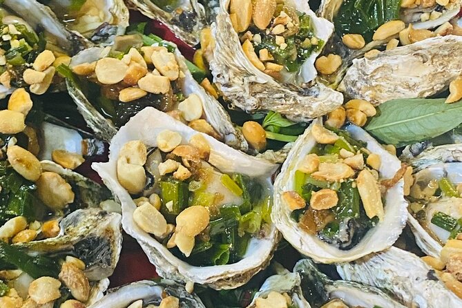 Ho Chi Minh City: Street Food & Sightseeing Tour with Local Guide - Stop 3: Ho Thi Ky Flower Market and bánh tráng nướng