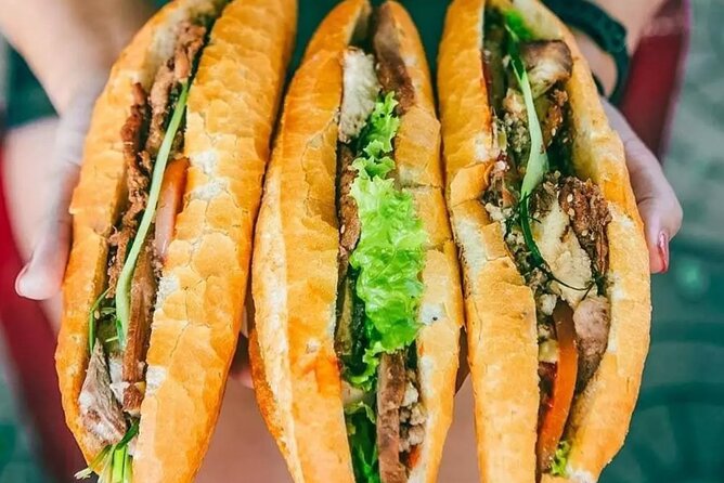 Ho Chi Minh City Street Food Tour & Sightseeing By Motorbike - A historic stop at the Thich Quang Duc Monument