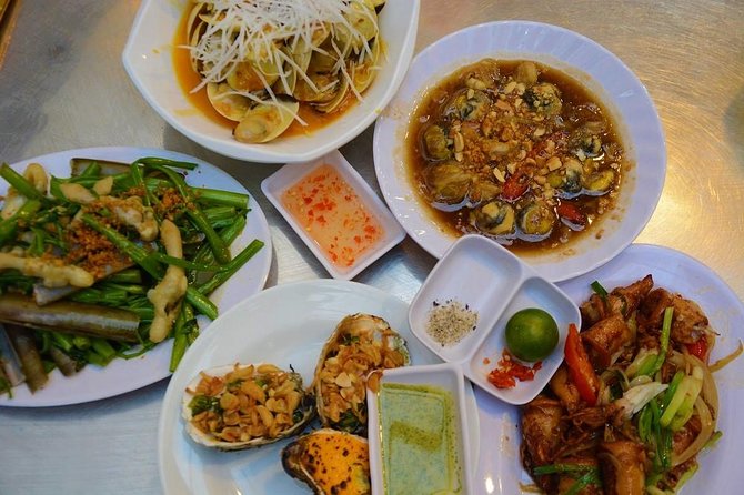 Ho Chi Minh Nightlife & Street Food Tour By Motorbike - The dinner is spread across several stops