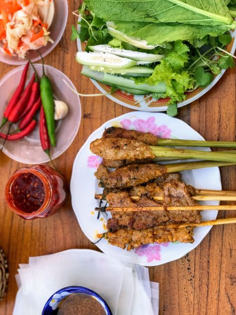 Hoi An Street Food Tour by Motorbike - Cao lau beside the Thu Bon River