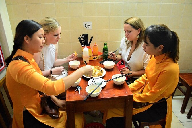 Led By Women - Hanoi Foodie Motorbike Tours - Huu Tiep Lake and the submerged B-52