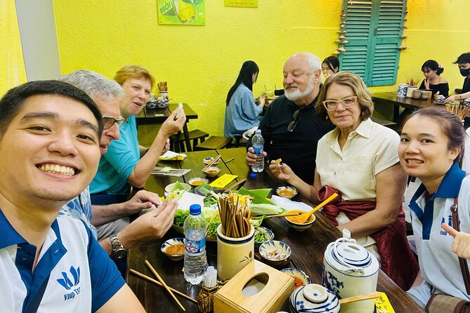 Motorbike Food Tour in Saigon Real Local Flavors - Seafood, cold beer, and Saigon’s social rhythm