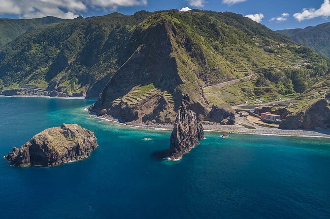 Motorcycle Half-Day Madeira Island East / West Tour (Self-Guided) - Seixal brings waterfalls and a difficult beach approach