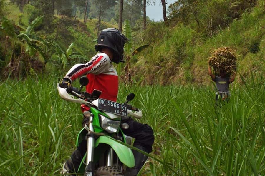 Mount Batur: Sunrise Dirt Bike Trek with Trained Riders - The daylight descent shows a different mountain