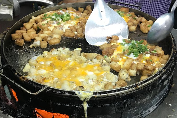 Private Ho Chi Minh Street Food Tour by Motorbike with Ao Dai Female Rider - Apartment buildings and the ride back