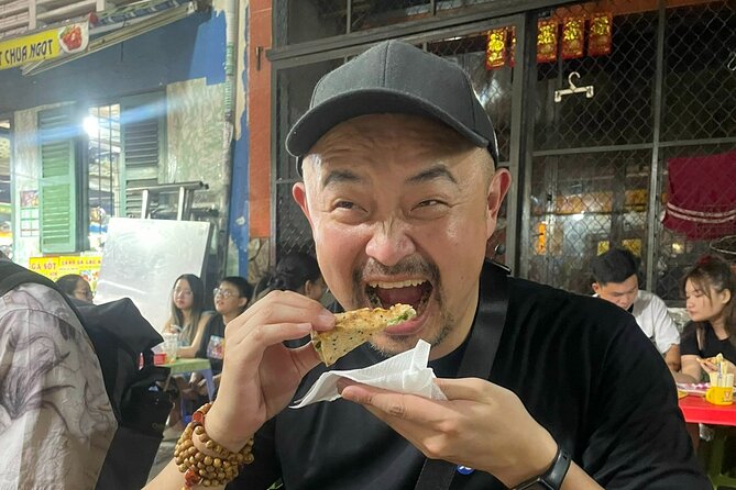 Private Saigon Ultimate Street Food & Motorbike Experience - Banh xeo in District 10, with two sizes to compare