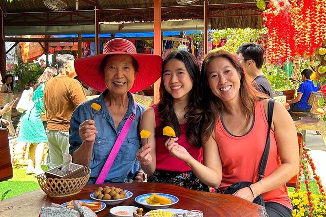 Private Scooter Street Food Tour in Saigon with 11 Tastings - District 10, flowers, and dessert