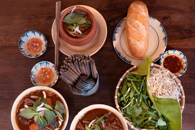 Private Street Food Motorbike Tour in Ho Chi Minh City - District 5: Chinese-Vietnamese flavors and coconut dessert
