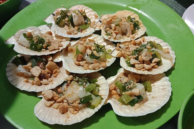 Saigon luxury food tour on motorbike with 10 authentic dishes - Ho Thi Ky Flower Market after dark
