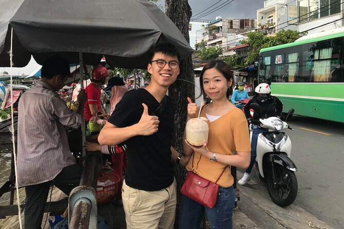 Saigon Slum tour and Saigon Chillspots by motorbike/ Aodai rider - The Flower Market and Lotus Craft