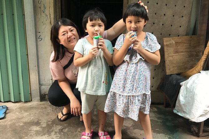 Saigon Slum tour and Saigon Chillspots by motorbike/ Aodai rider - Who Will Get the Most From This Tour