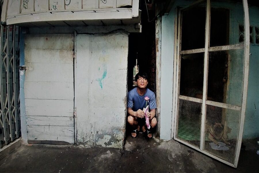 Saigon Slum Tour with Motorbike - District 5 to 7: old mafia streets and riverside communities