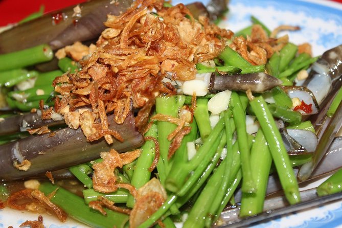 Saigon Street Food & Hidden Gems Tour: Live Like a Local - Seeing Saigon from the back of a motorbike