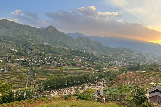 Sapa Half-Day Motorbike Tour: Villages & Rice Fields - Ta Van brings the route into a lived-in community