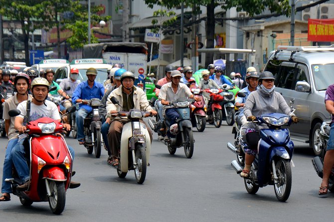 Small group Saigon Inside Out by Motorbike for 3 Hours - Ho Thi Ky Flower Market: the best early stop