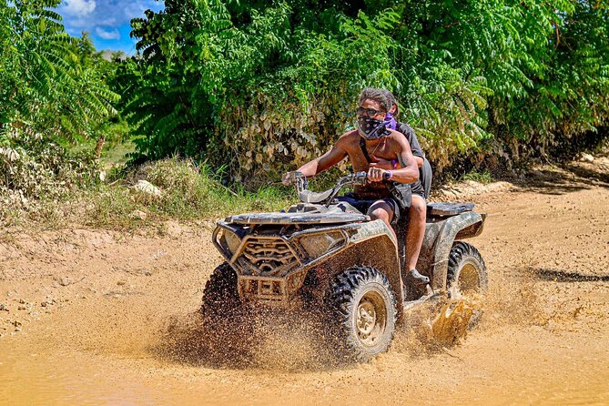 Tour Moto ATV en Punta Cana, Playa, Cueva Taína y Casa Dominicana - A Punta Cana outing built around mud, speed, and variety